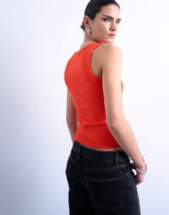 Model wearing Rib racer vest in orange