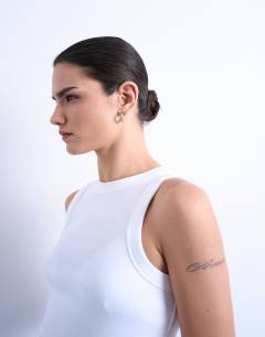 Model wearing Rib racer vest in white