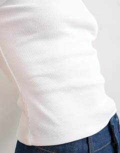 Model wearing Rib racer vest in white