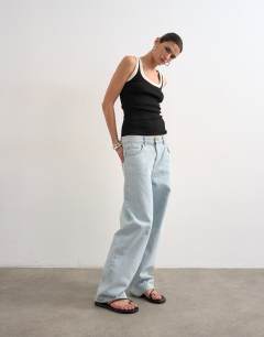 Model wearing Rib scoop neck vest in black and ecru