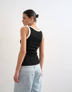 Model wearing Rib scoop neck vest in black and ecru