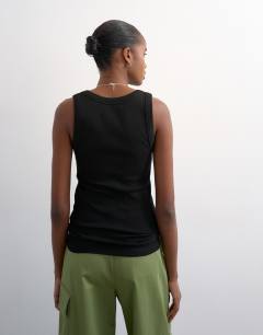 Model wearing Rib scoop neck vest in black