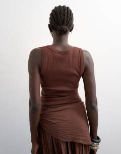 Model wearing Rib scoop neck vest in chocolate brown