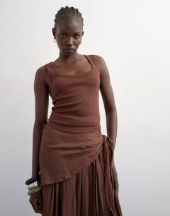 Model wearing Rib scoop neck vest in chocolate brown