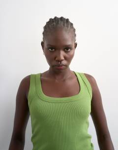Model wearing Rib scoop neck vest in green