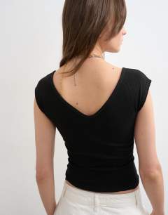 Model wearing Rib v-neck cap sleeve tank in black