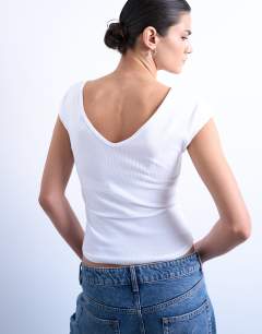 Model wearing Rib v-neck cap sleeve tank in white