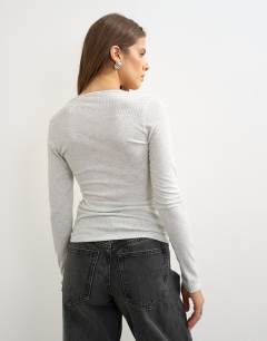 Model wearing Rib v-neck henley long sleeve top in light grey