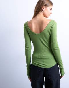 Model wearing Rib v-neck long sleeve curved hem top in green