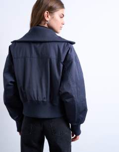 Model wearing Rib wide collar short bomber jacket in navy