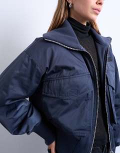 Model wearing Rib wide collar short bomber jacket in navy