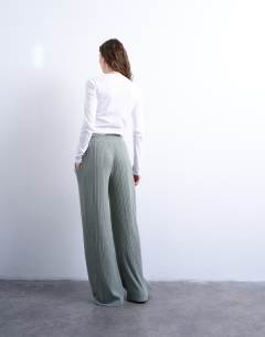 Model wearing Rib wide leg trousers in sage green