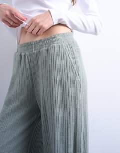Model wearing Rib wide leg trousers in sage green