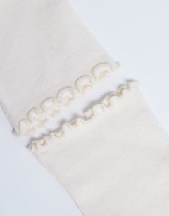 Model wearing Ribbed frill socks in buttermilk