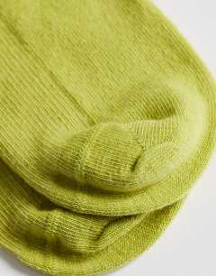 Model wearing Ribbed frill socks in lime