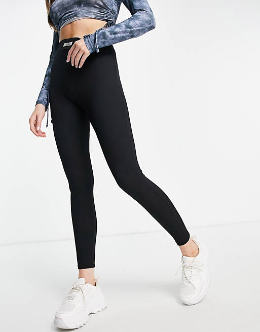 Women Topshop ribbed legging with front label in black 