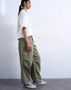 Model wearing Ripstop cargo trouser with drawcord hem in khaki