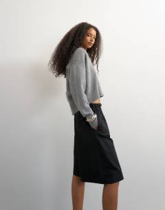 Model wearing Ripstop short with toggle detail in black