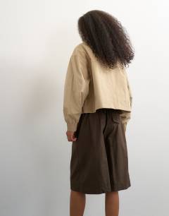 Model wearing Ripstop short with toggle detail in brown