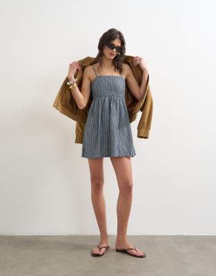 Robe en jean à rayures avec bretelles et dos ouvert - Bleu 36