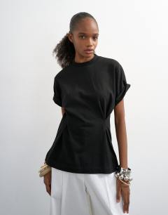 Model wearing Roll sleeve cinch tee in black