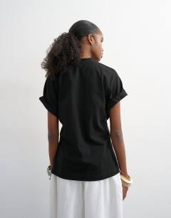 Model wearing Roll sleeve cinch tee in black