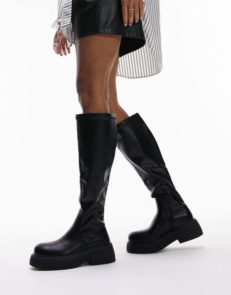Topshop Rolo knee high textured sole boots in black - view 1