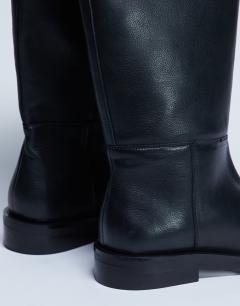 Model wearing Rory real leather riding boots in black