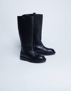 Model wearing Rory real leather riding boots in black
