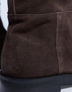 Model wearing Rory real suede leather riding boots in chocolate