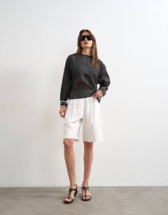 Model wearing Round neck organza top in black