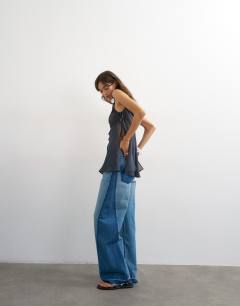 Model wearing Ruched armhole tie side tunic in navy