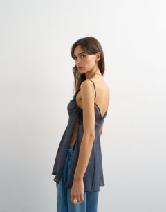 Model wearing Ruched armhole tie side tunic in navy