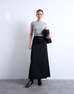 Model wearing Ruched asymmetric midi skirt in black 