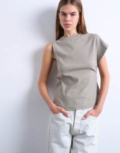 Model wearing Ruched back one sleeve top in taupe