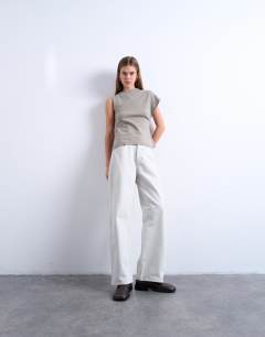 Model wearing Ruched back one sleeve top in taupe
