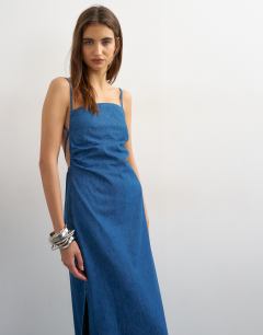 Model wearing Ruched backless maxi dress in rich blue