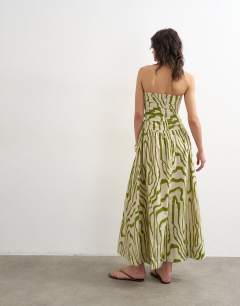 Model wearing Ruched bandeau midi dress in stripe