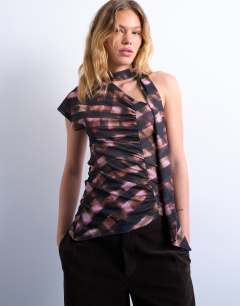Model wearing Ruched check print scarf detail asymmetric hem top in chocolate