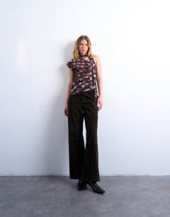 Model wearing Ruched check print scarf detail asymmetric hem top in chocolate