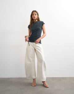 Model wearing Ruched detail cupro top in washed black