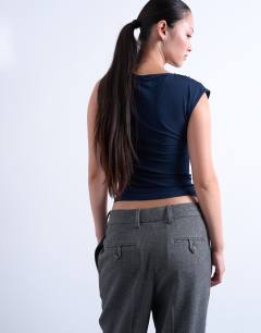 Model wearing Ruched drape tank in navy