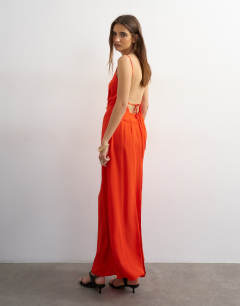 Model wearing Ruched front cami maxi dress in red