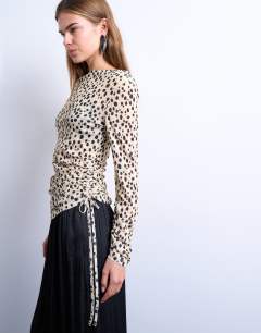 Ruched long sleeve top in animal print