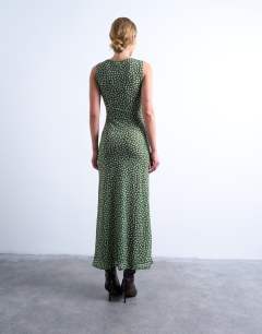 Model wearing Ruched polkadot maxi dress in green