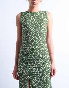 Model wearing Ruched polkadot maxi dress in green
