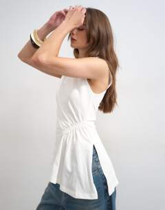Ruched side detail asymmetric top in ivory