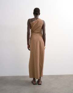 Model wearing Ruched side gathered shoulder midi dress in brown lime stripe