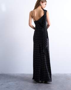 Model wearing Ruched side midi dress with drape back detail in black polka dot