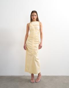 Model wearing Ruched sleeveless midi dress in buttermilk